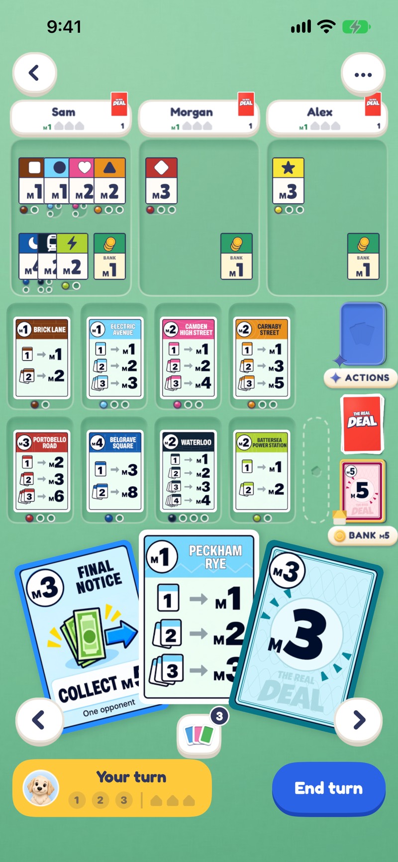 The Real Deal's game table: three rivals' cities above, the player's city and a fanned hand of cards below.